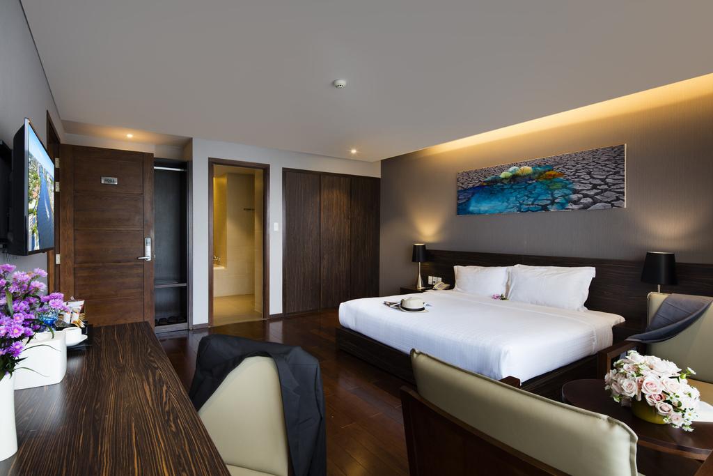The room is extremely luxuriously designed with high quality wooden furniture